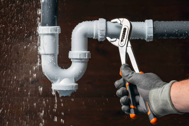 Professional Emergency Plumber technician working in Falcon, KY